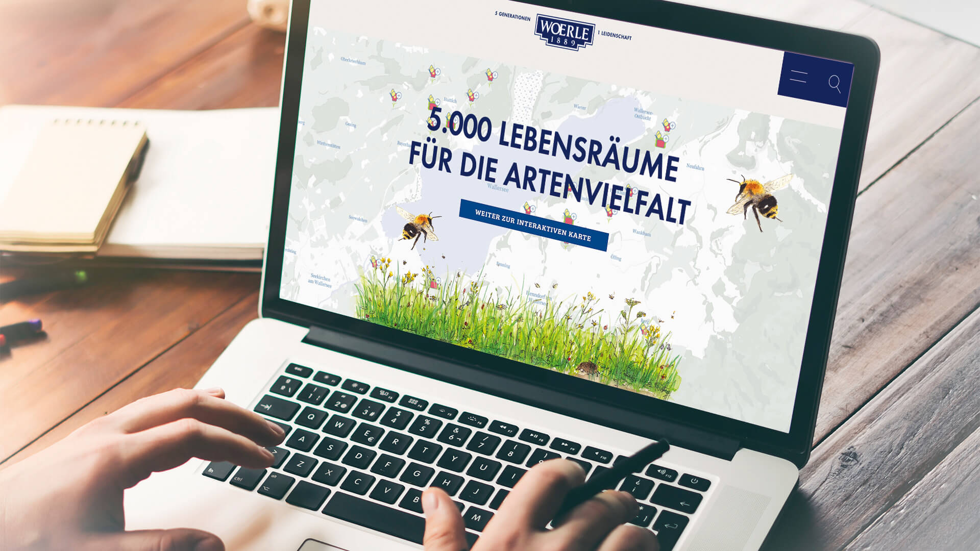 Ein Computerbildschirm, auf dem das Ziel von Woerles Nachhaltigkeitsprojekt steht: 5.000 Lebensräume für die Artenvielfalt